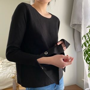 Knit top with sleeve detail